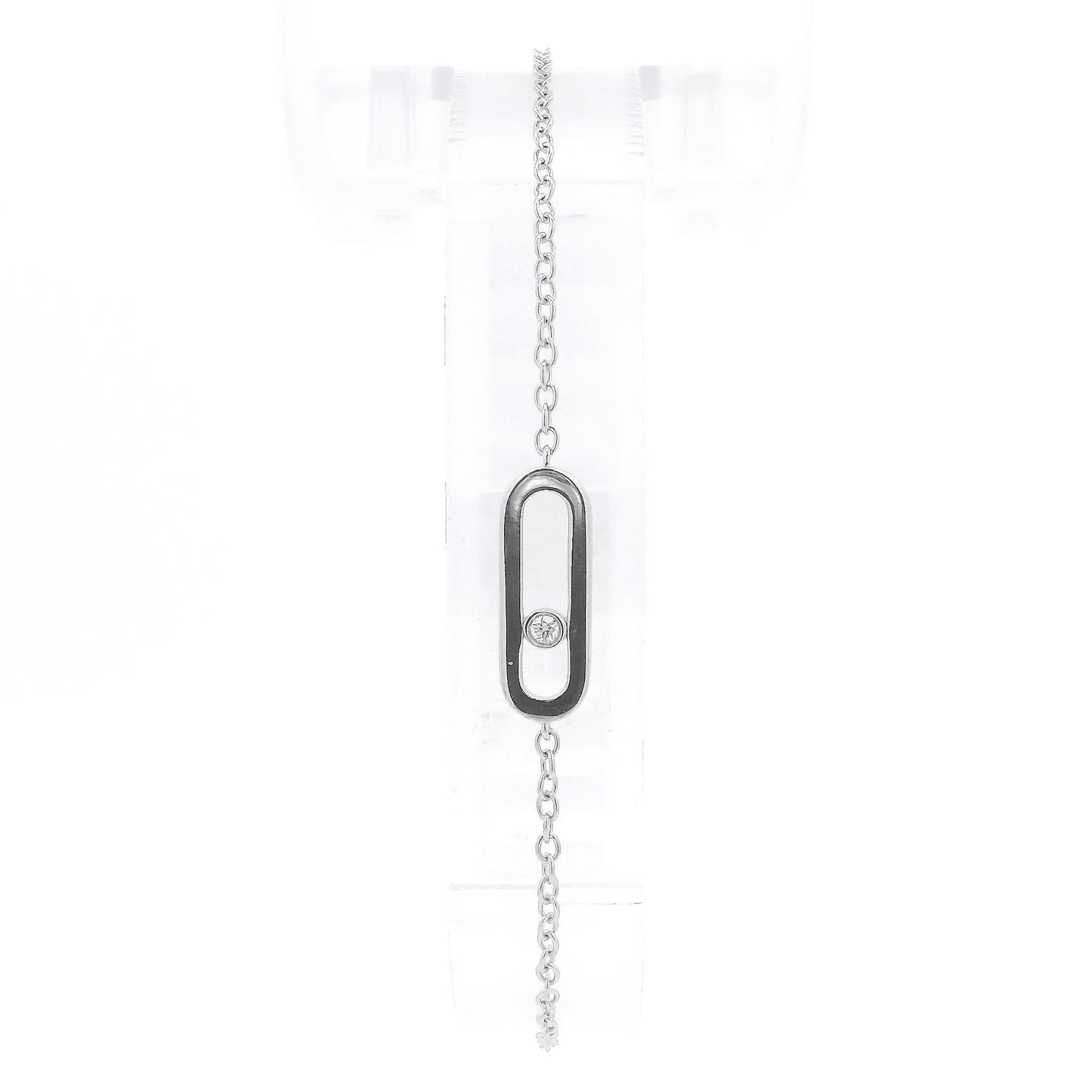 A White Gold Chain Bracelet with a oval in the senter and a single round cut natural Diamond offset in the center at Forever Rox Fine Jewelry, Lake Tahoes Best Jewelry Store