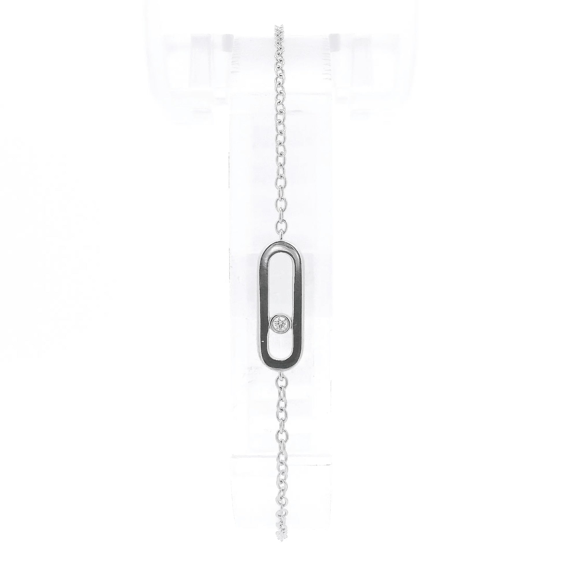 A White Gold Chain Bracelet with a oval in the senter and a single round cut natural Diamond offset in the center at Forever Rox Fine Jewelry, Lake Tahoes Best Jewelry Store