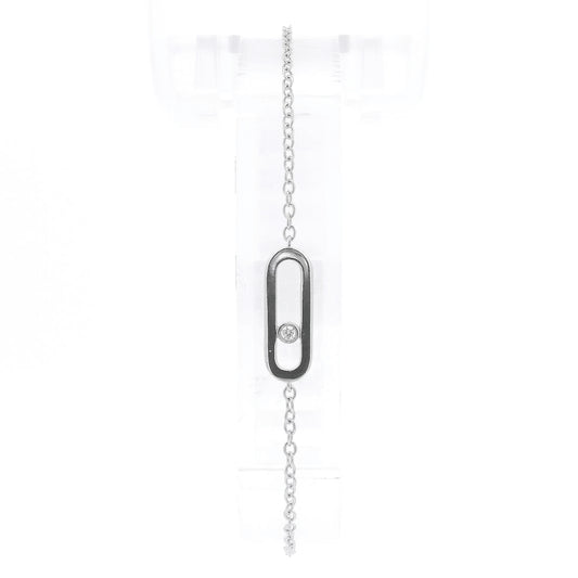 A White Gold Chain Bracelet with a oval in the senter and a single round cut natural Diamond offset in the center at Forever Rox Fine Jewelry, Lake Tahoes Best Jewelry Store