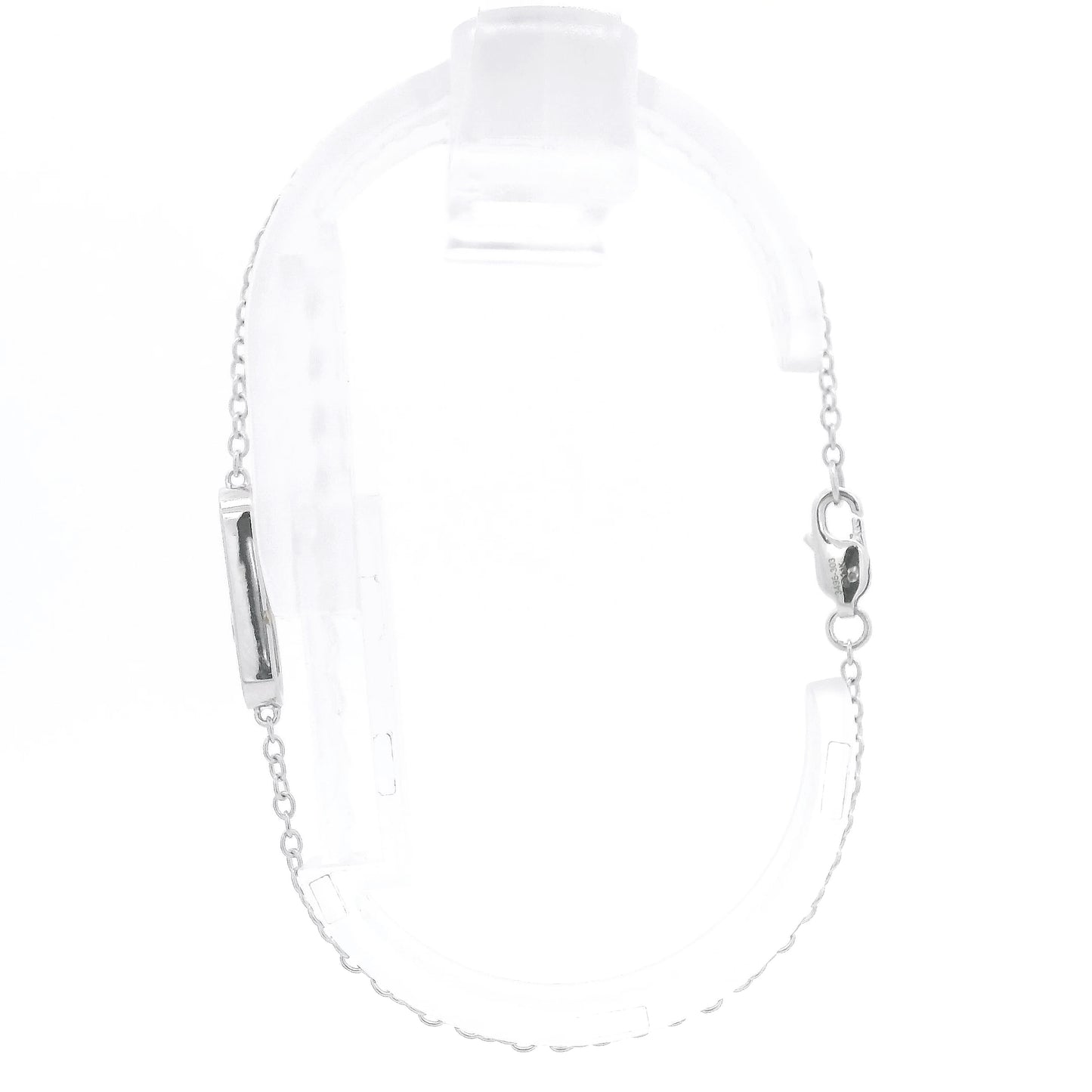 A White Gold Chain Bracelet with a oval in the senter and a single round cut natural Diamond offset in the center at Forever Rox Fine Jewelry, Lake Tahoes Best Jewelry Store