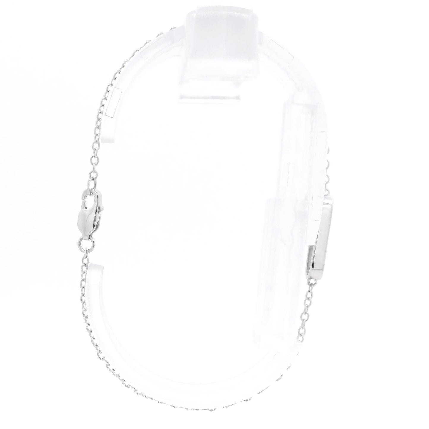 A White Gold Chain Bracelet with a oval in the senter and a single round cut natural Diamond offset in the center at Forever Rox Fine Jewelry, Lake Tahoes Best Jewelry Store