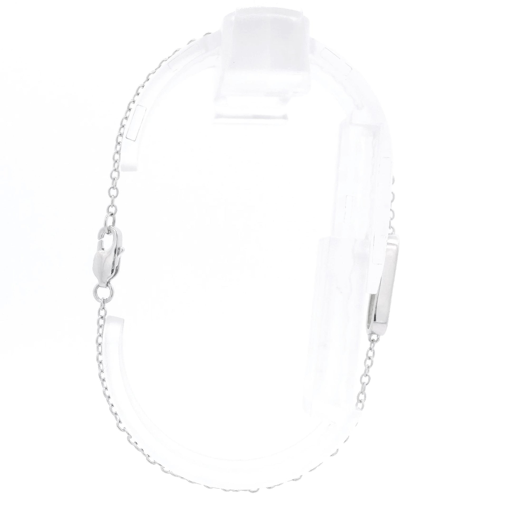 A White Gold Chain Bracelet with a oval in the senter and a single round cut natural Diamond offset in the center at Forever Rox Fine Jewelry, Lake Tahoes Best Jewelry Store
