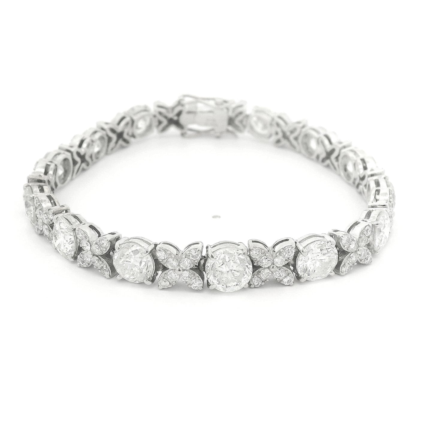 A White Gold X&O with round cut diamonds for the O and melle round cut diamonds for the X at Forever Rox Fine Jewelry, Lake Tahoes Best Jewelry Store
