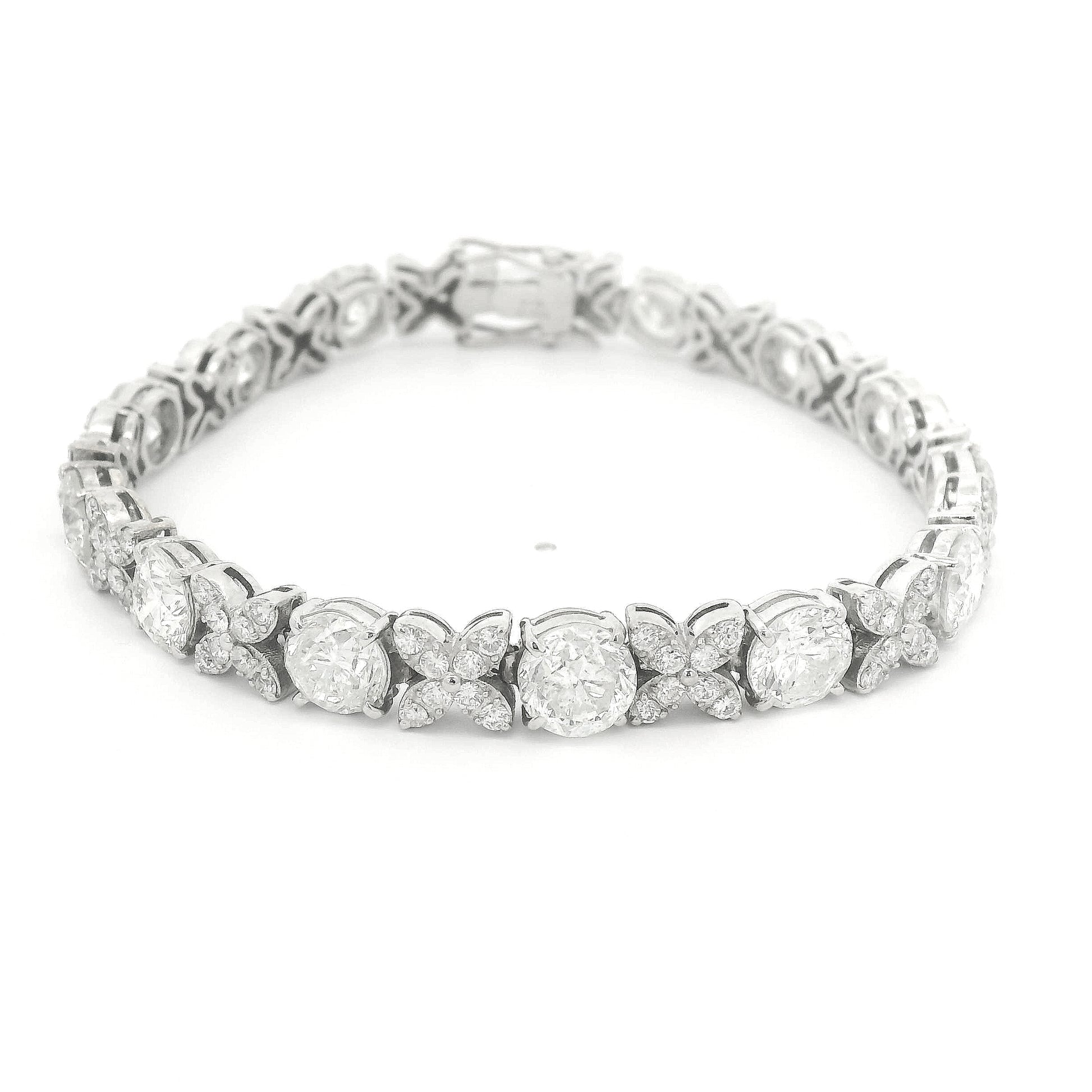 A White Gold X&O with round cut diamonds for the O and melle round cut diamonds for the X at Forever Rox Fine Jewelry, Lake Tahoes Best Jewelry Store
