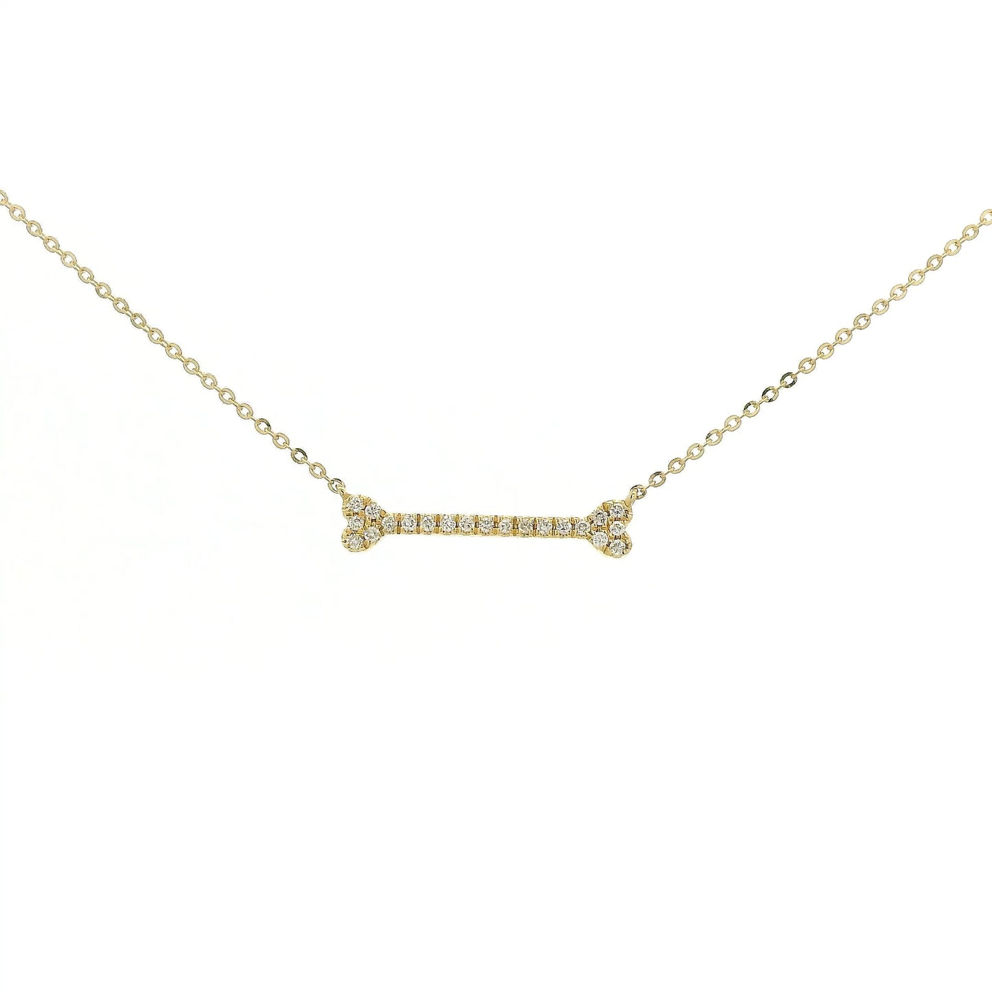 A Yellow Gold Dog Bone Pendant with diamonds at Forever Rox Fine Jewelry, Lake Tahoes Best Jewelry Store