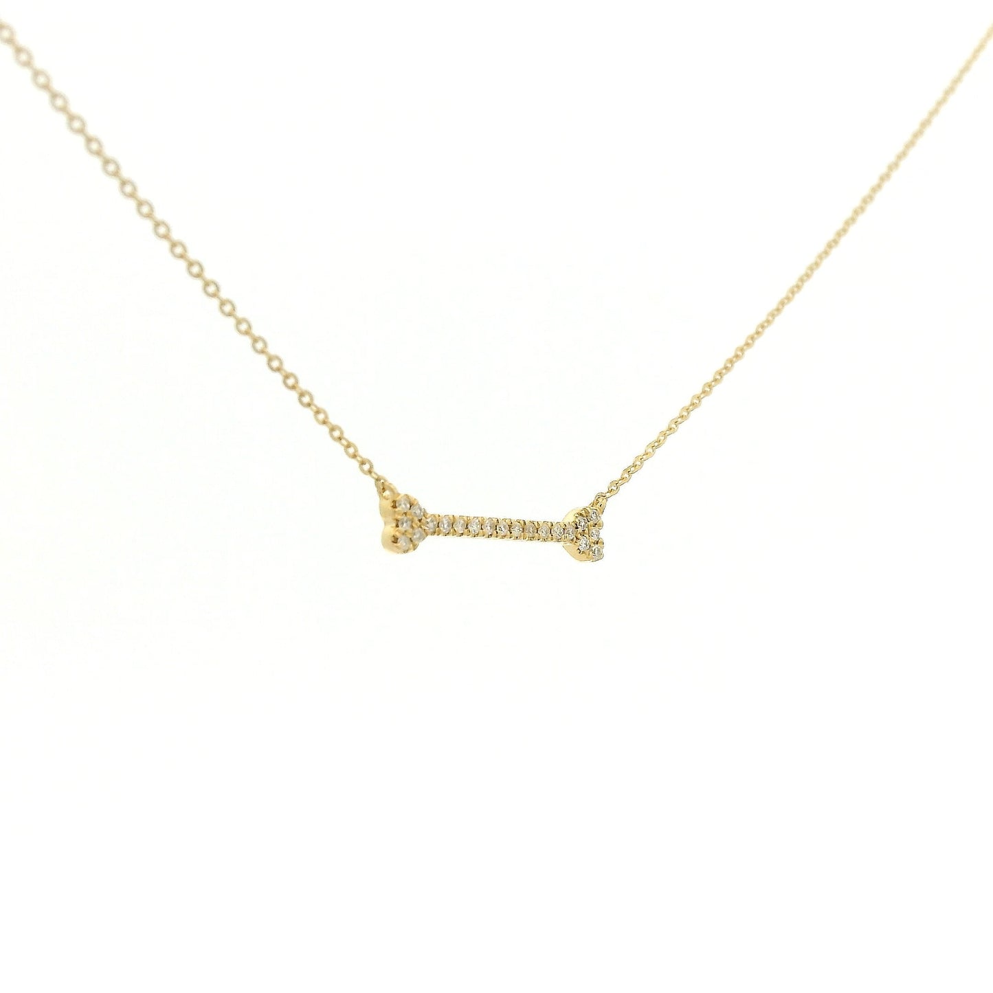 A Yellow Gold Dog Bone Pendant with diamonds at Forever Rox Fine Jewelry, Lake Tahoes Best Jewelry Store