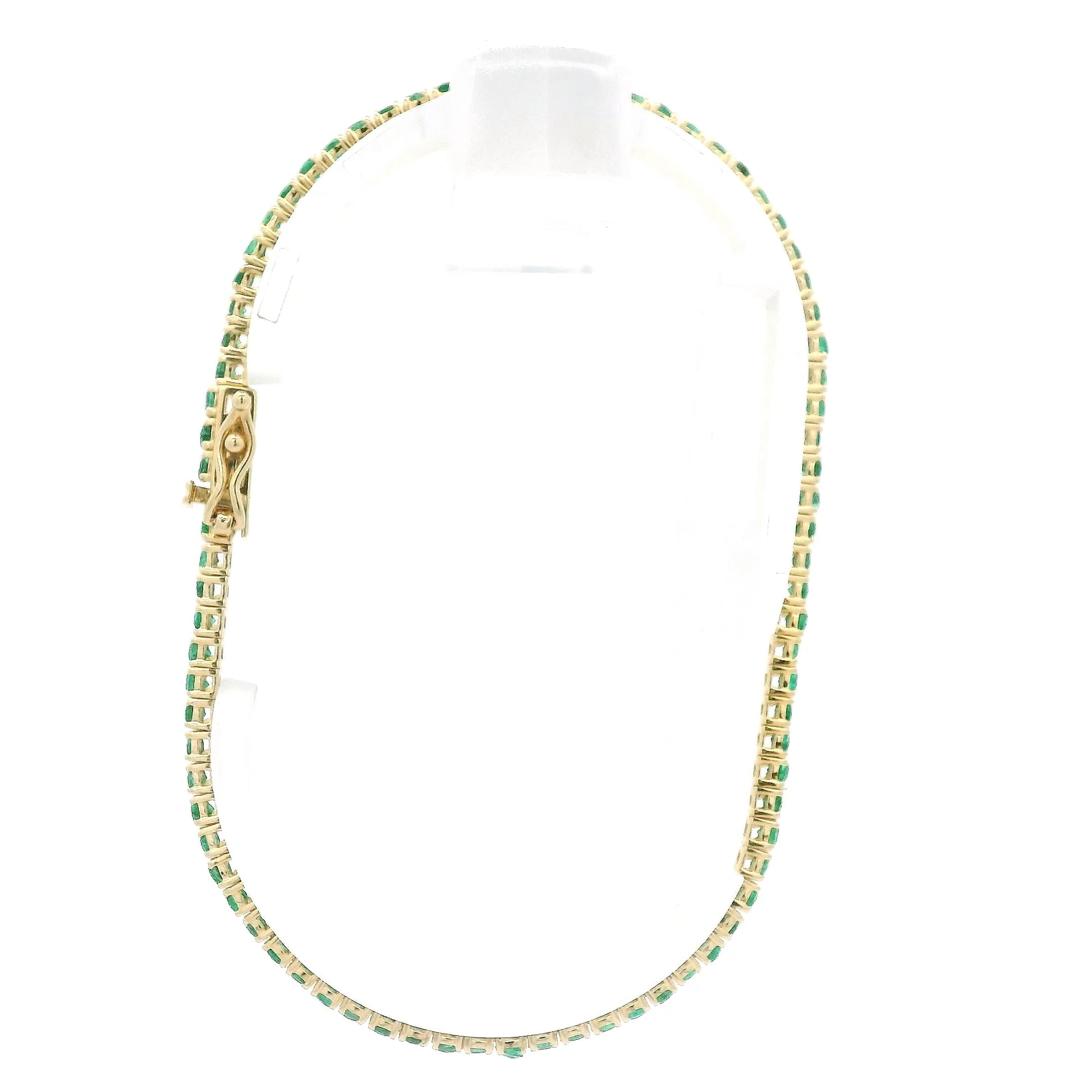 Emerald Tennis Bracelet set in Yellow Gold at Forever Rox Fine Jewelry 