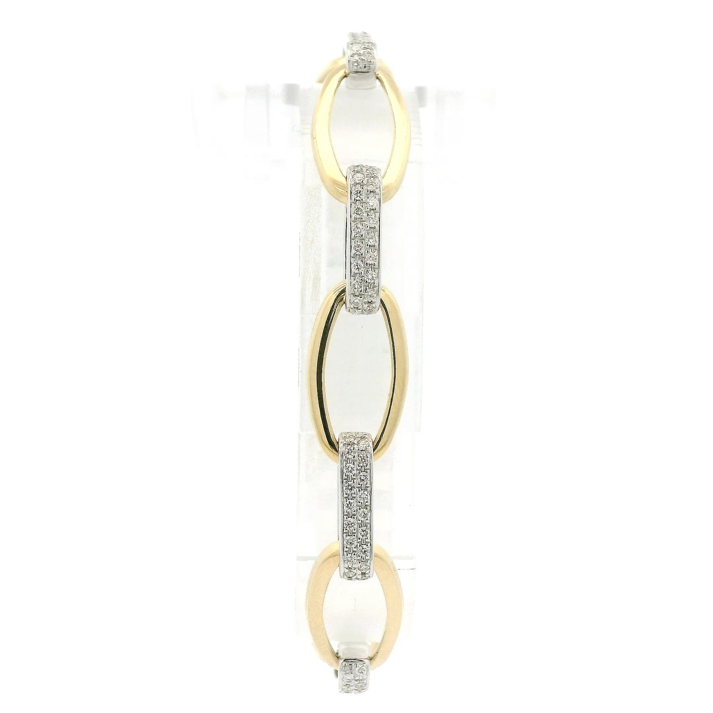 A Two Tone Gold Bracelet with a oval linkls and natural Diamond links alternating at Forever Rox Fine Jewelry, Lake Tahoes Best Jewelry Store