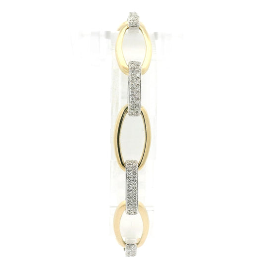 A Two Tone Gold Bracelet with a oval linkls and natural Diamond links alternating at Forever Rox Fine Jewelry, Lake Tahoes Best Jewelry Store