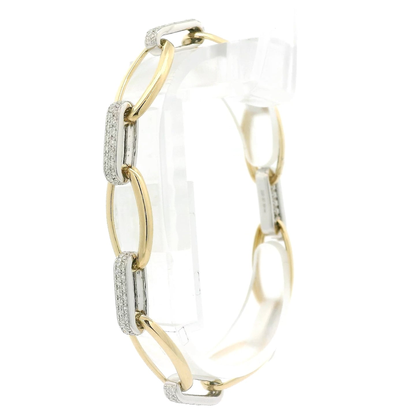 A Two Tone Gold Bracelet with a oval linkls and natural Diamond links alternating at Forever Rox Fine Jewelry, Lake Tahoes Best Jewelry Store