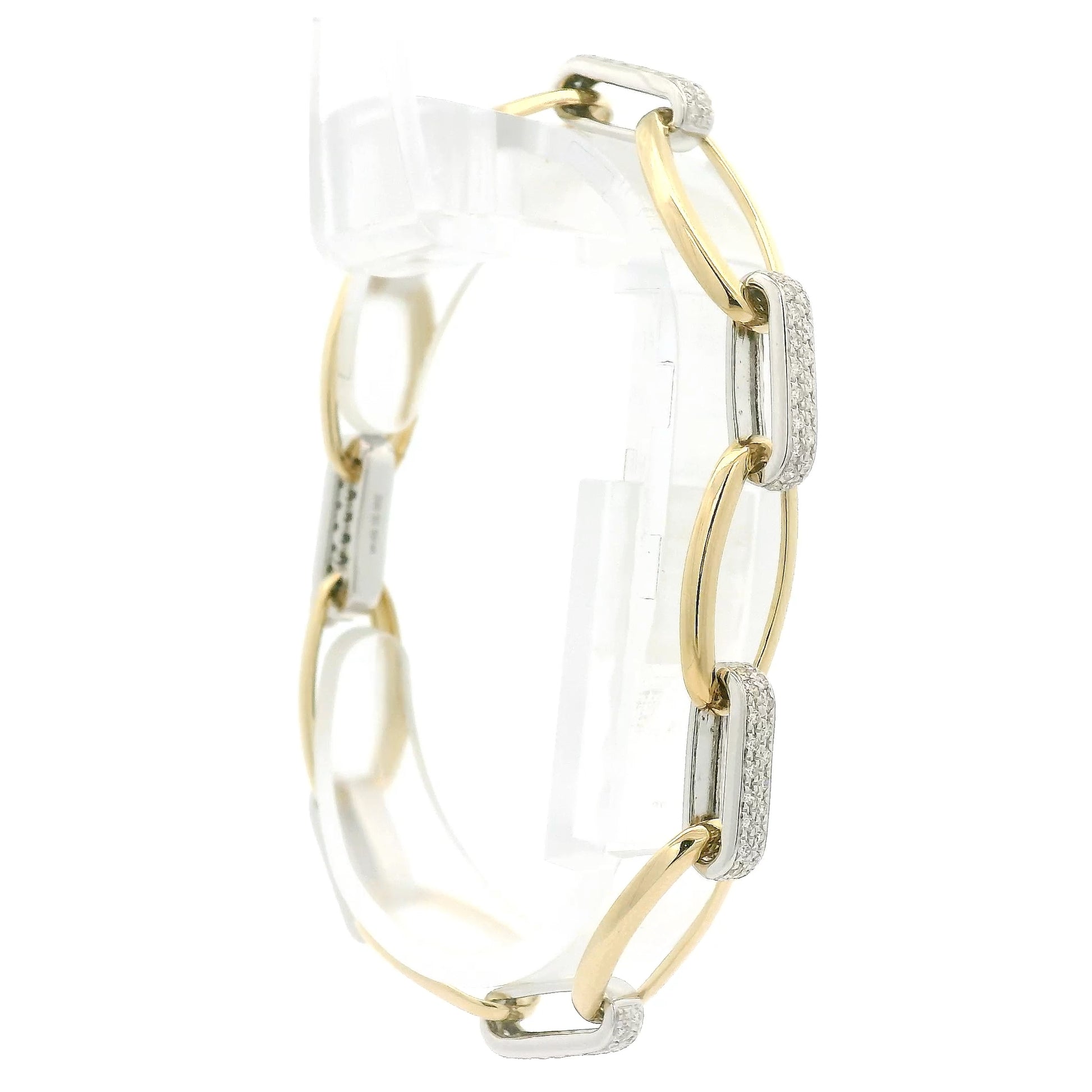 A Two Tone Gold Bracelet with a oval linkls and natural Diamond links alternating at Forever Rox Fine Jewelry, Lake Tahoes Best Jewelry Store