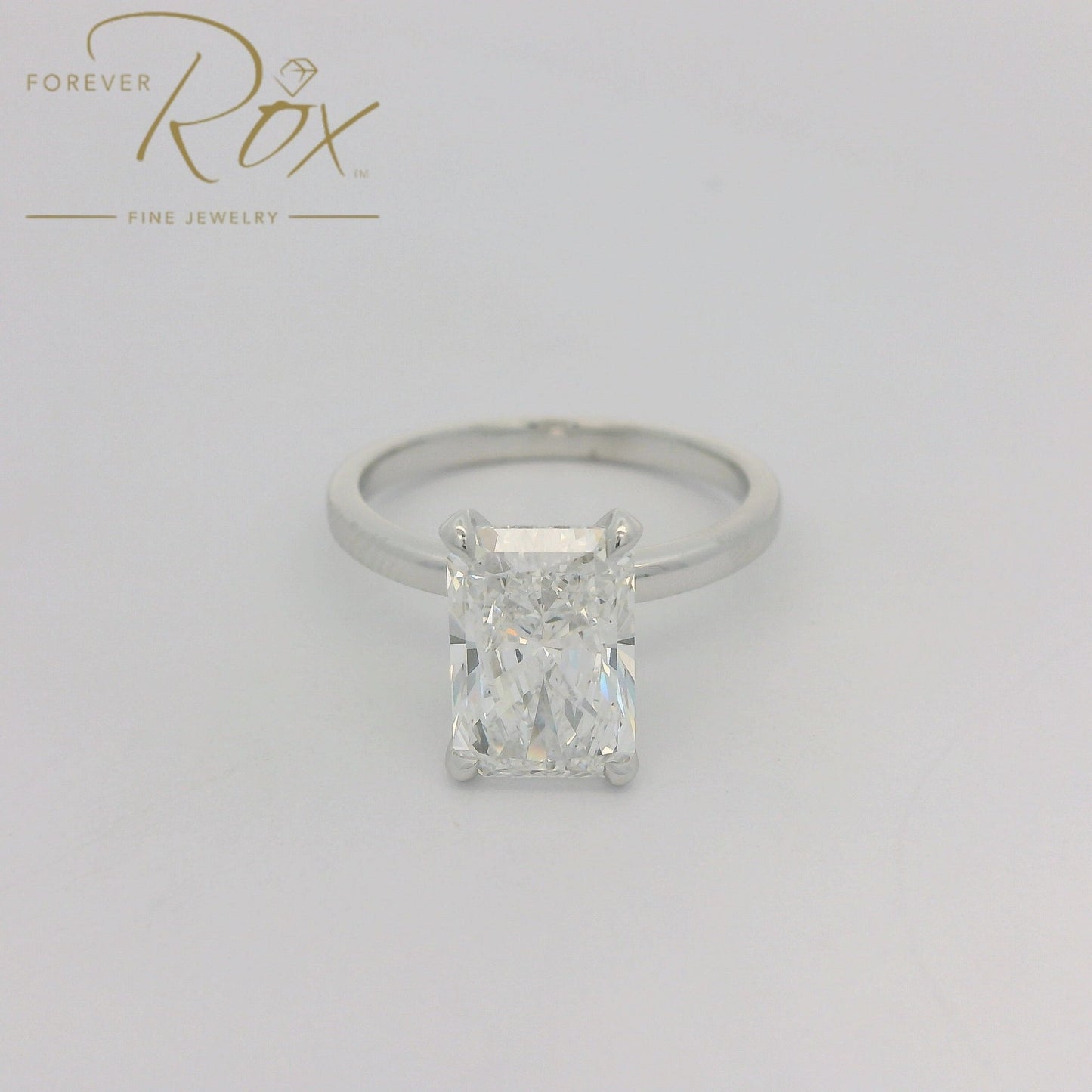 Custom Long Radiant Cut D - VS1 Diamond Ring with Diamonds Around Head - Forever Rox Fine Jewelry