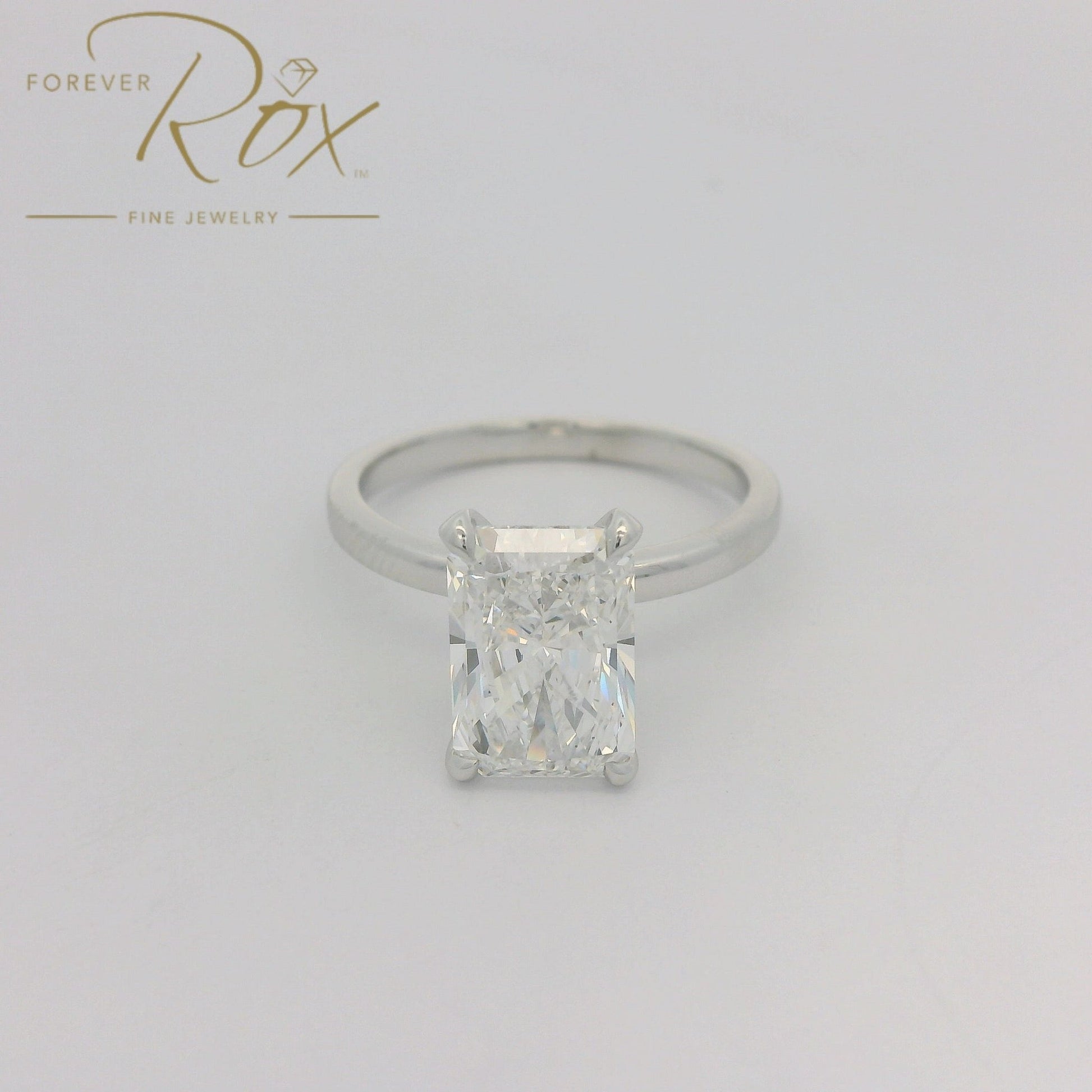 Custom Long Radiant Cut D - VS1 Diamond Ring with Diamonds Around Head - Forever Rox Fine Jewelry