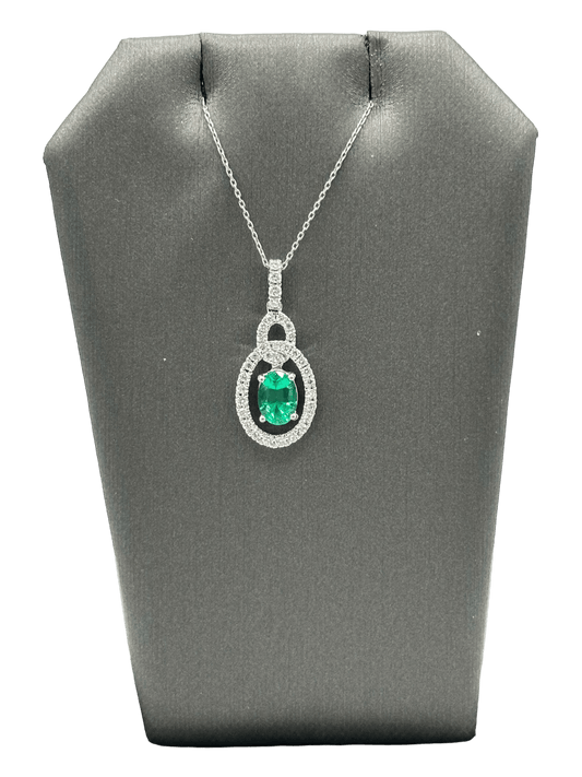 Oval Cut Emerald Pendant With Diamond Halo & Diamond Bail - Forever Rox