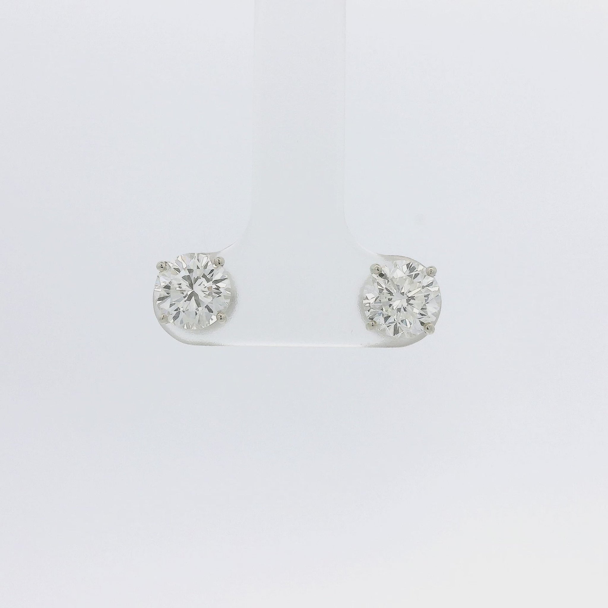 A Pair of White Gold Round Cut Diamond Stud Earrings at Forever Rox Fine Jewelry, Lake Tahoes Best Jewelry Store