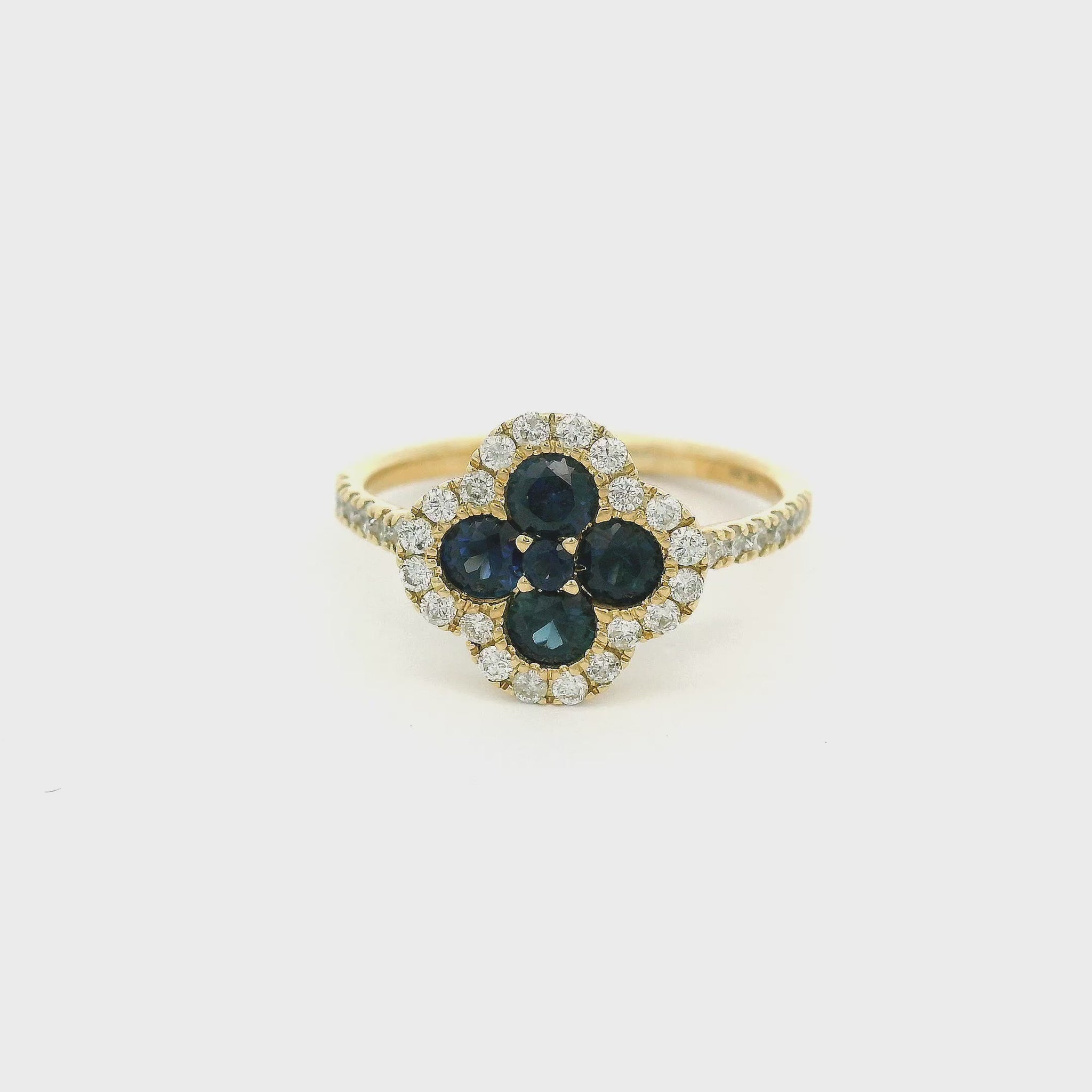 Yellow Gold ring with blue sapphires and diamonds in a clover design setting at Forever Rox Fine Jewelry 