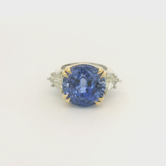 Product #: 69628MU> Stone Weight: 18.95ctw Natural Certified Ceylon Sapphire. Accent Stone: 2.16ctw Natural Trillion Cut Diamonds. Metal: Platinum & 18k Yellow Gold. 
