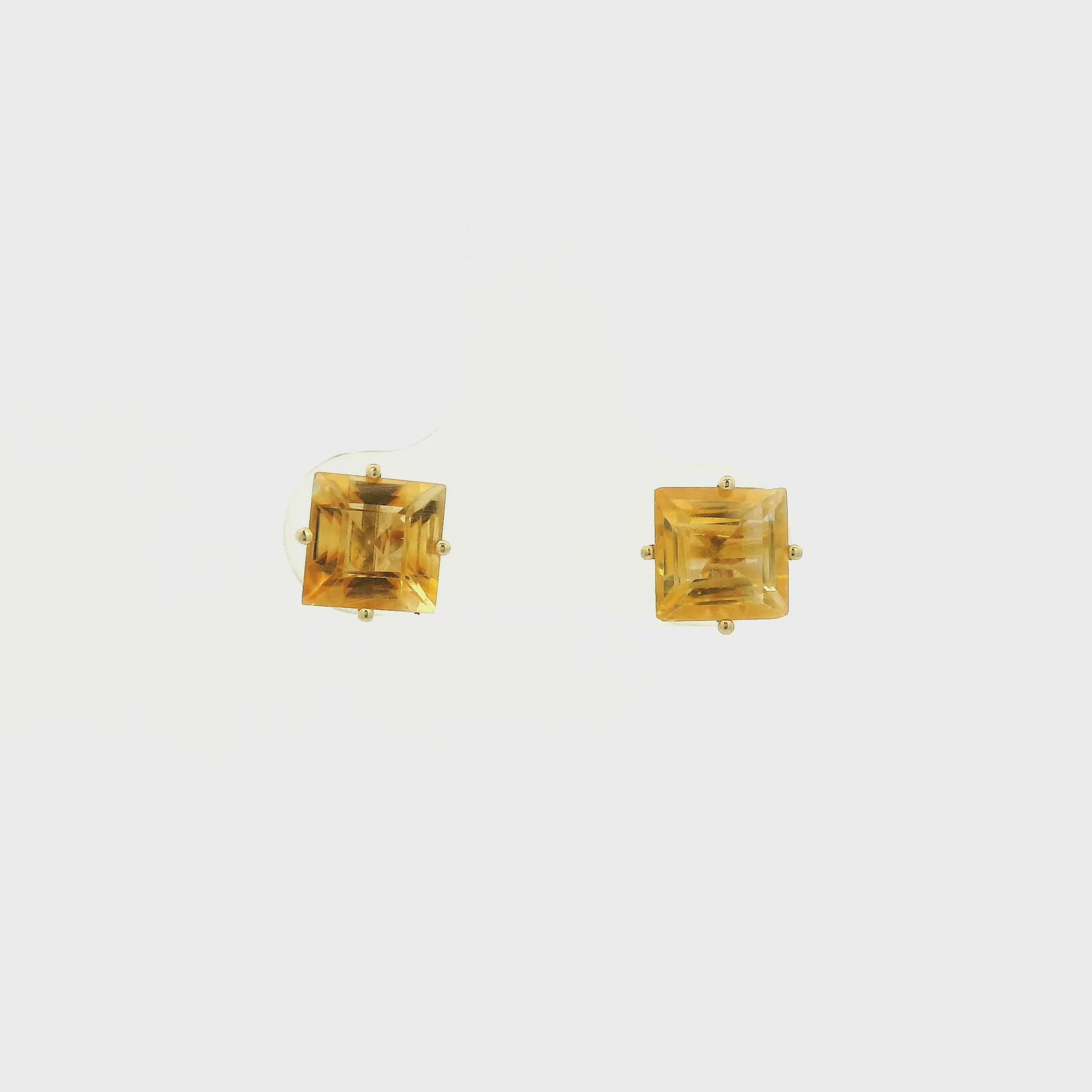 A Pair of Yellow Gold Stud Earrings with prong set princess cut natural Citrine at Forever Rox Fine Jewelry, Lake Tahoes Best Jewelry Store
