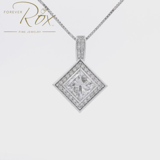 This is a Custom White Gold Bezel Set Princess Cut DIamond Pendant with Channel Set Round Cut Diamond Halo mad at Forever Rox Fine Jewelry, The BEst Jewelry Store in Lake Tahoe