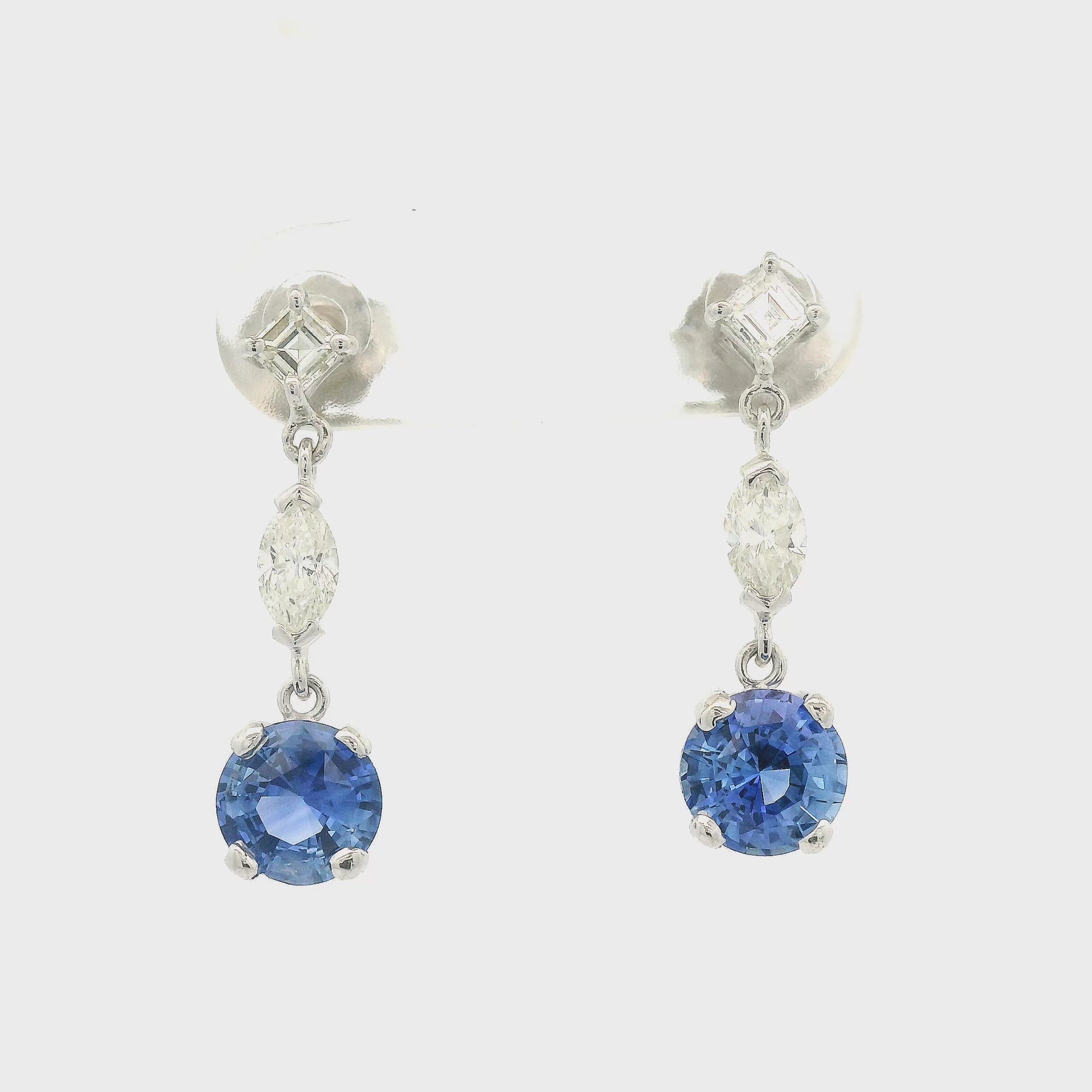 Blue Ceylon Sapphires Dangling from Square Emerald Cut Diamonds and Marquise Cut Diamonds earrings Forever Rox Fine Jewelry 