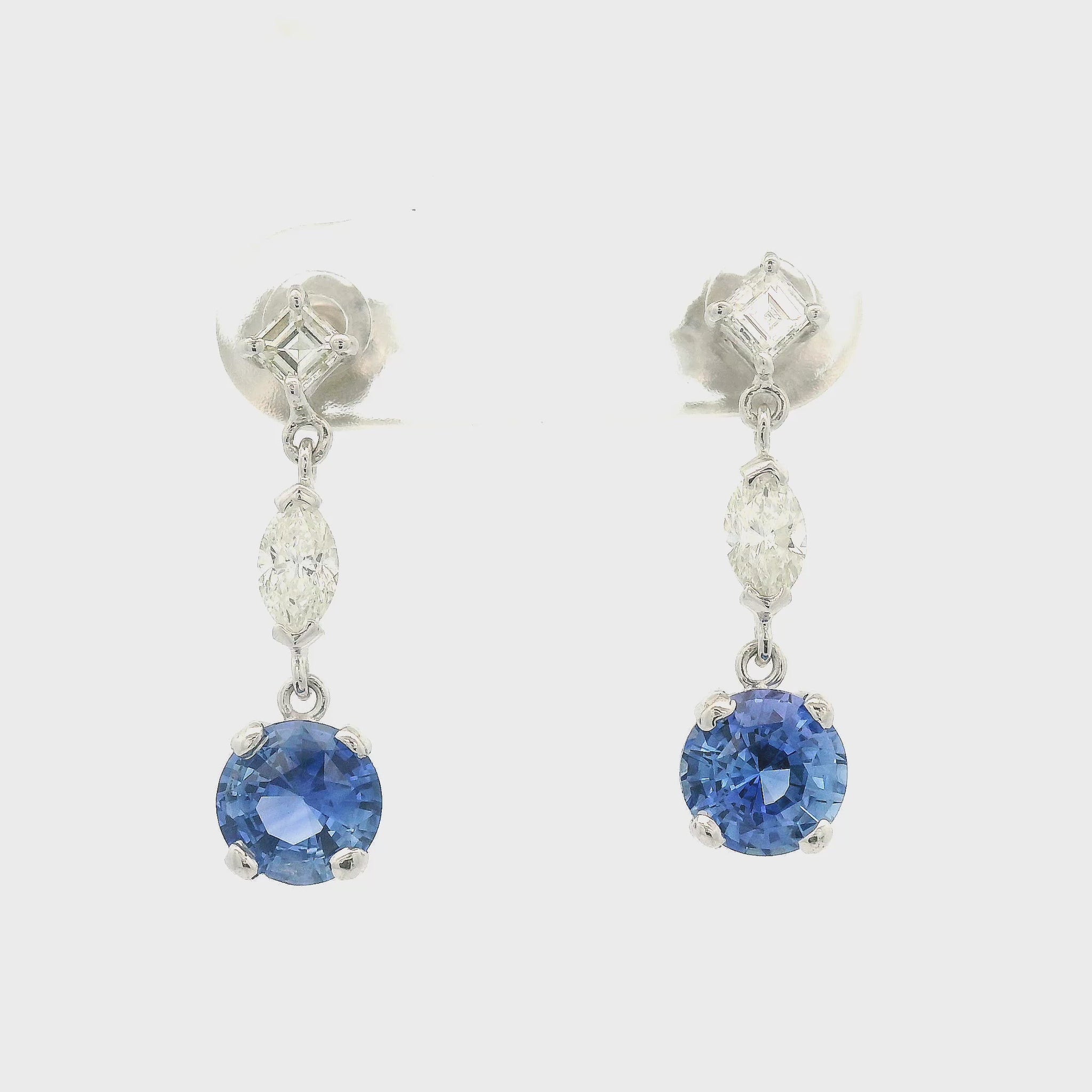 Blue Ceylon Sapphires Dangling from Square Emerald Cut Diamonds and Marquise Cut Diamonds earrings Forever Rox Fine Jewelry 