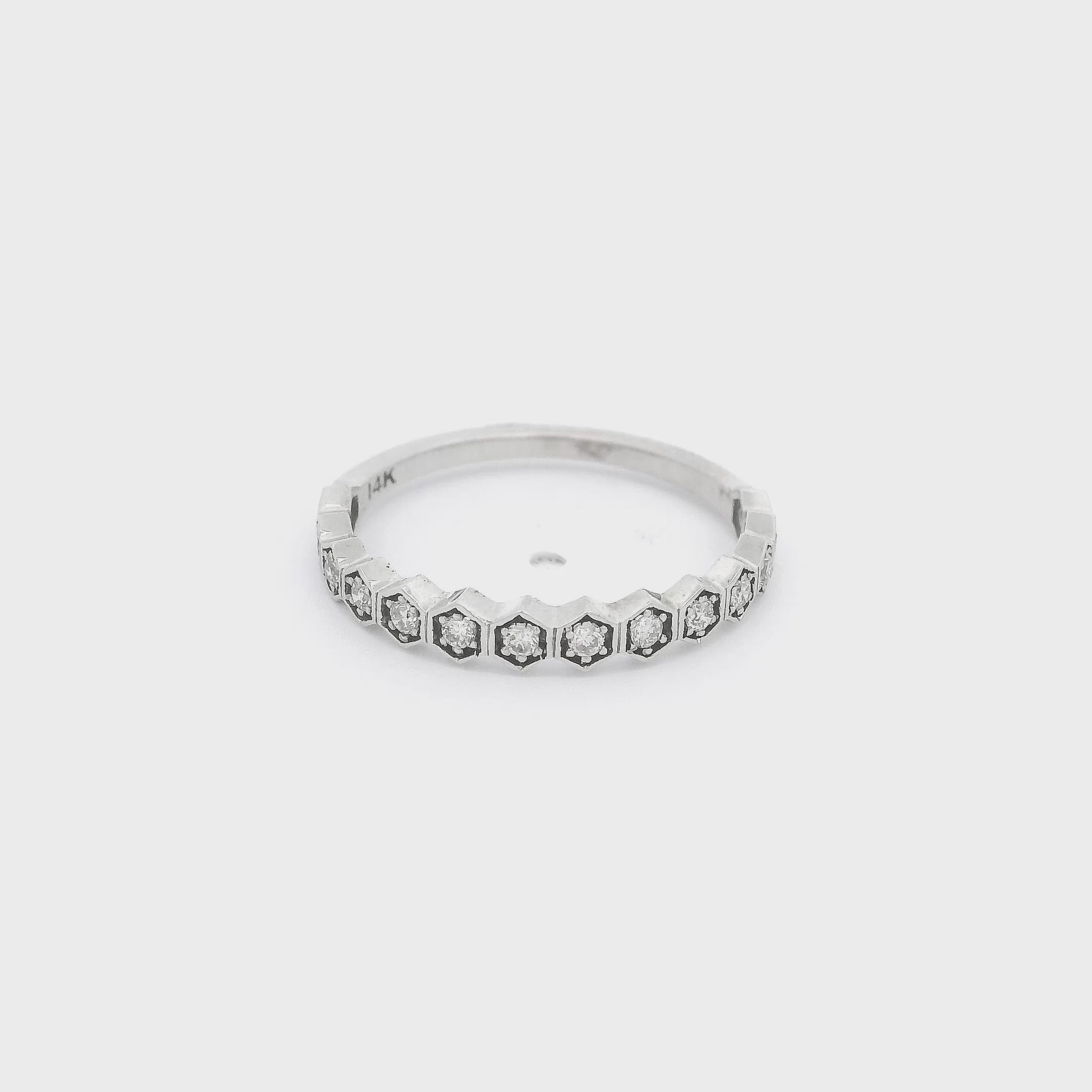 A White Gold Band with hexagon bezel set diamonds at Forever Rox Fine Jewelry, Lake Tahoes Best Jewelry Store