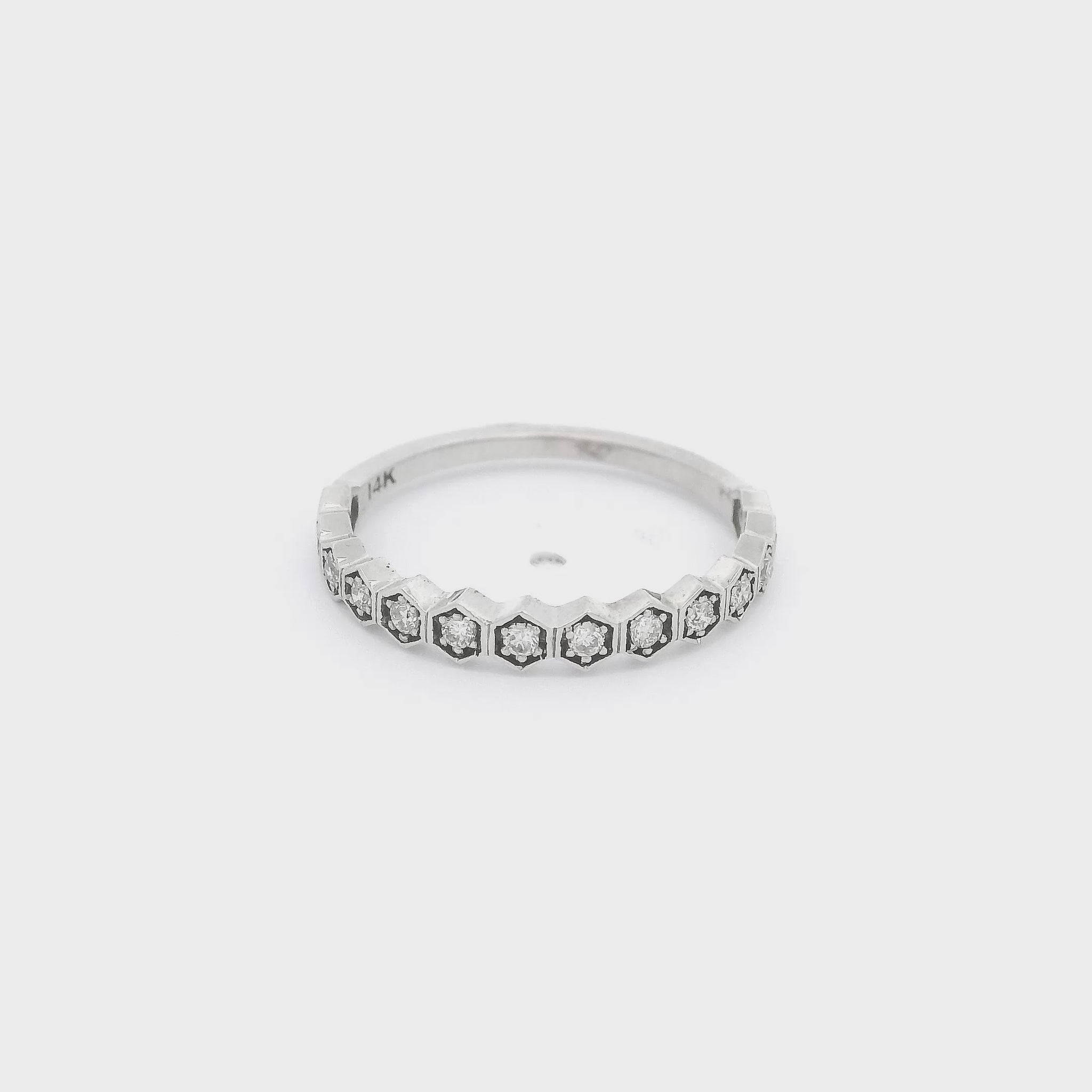 A White Gold Band with hexagon bezel set diamonds at Forever Rox Fine Jewelry, Lake Tahoes Best Jewelry Store