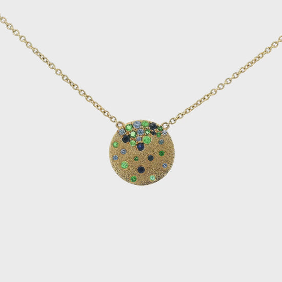 A Yellow Gold Pendant with flush set natural Sapphires & Tsavorites at Forever Rox Fine Jewelry, Lake Tahoes Best Jewelry Store