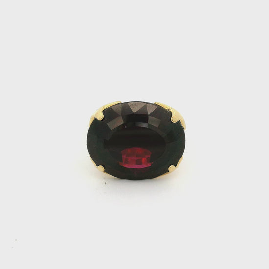 Red rhodolite garnet set in a yellow gold ring at forever rox fine jewelry