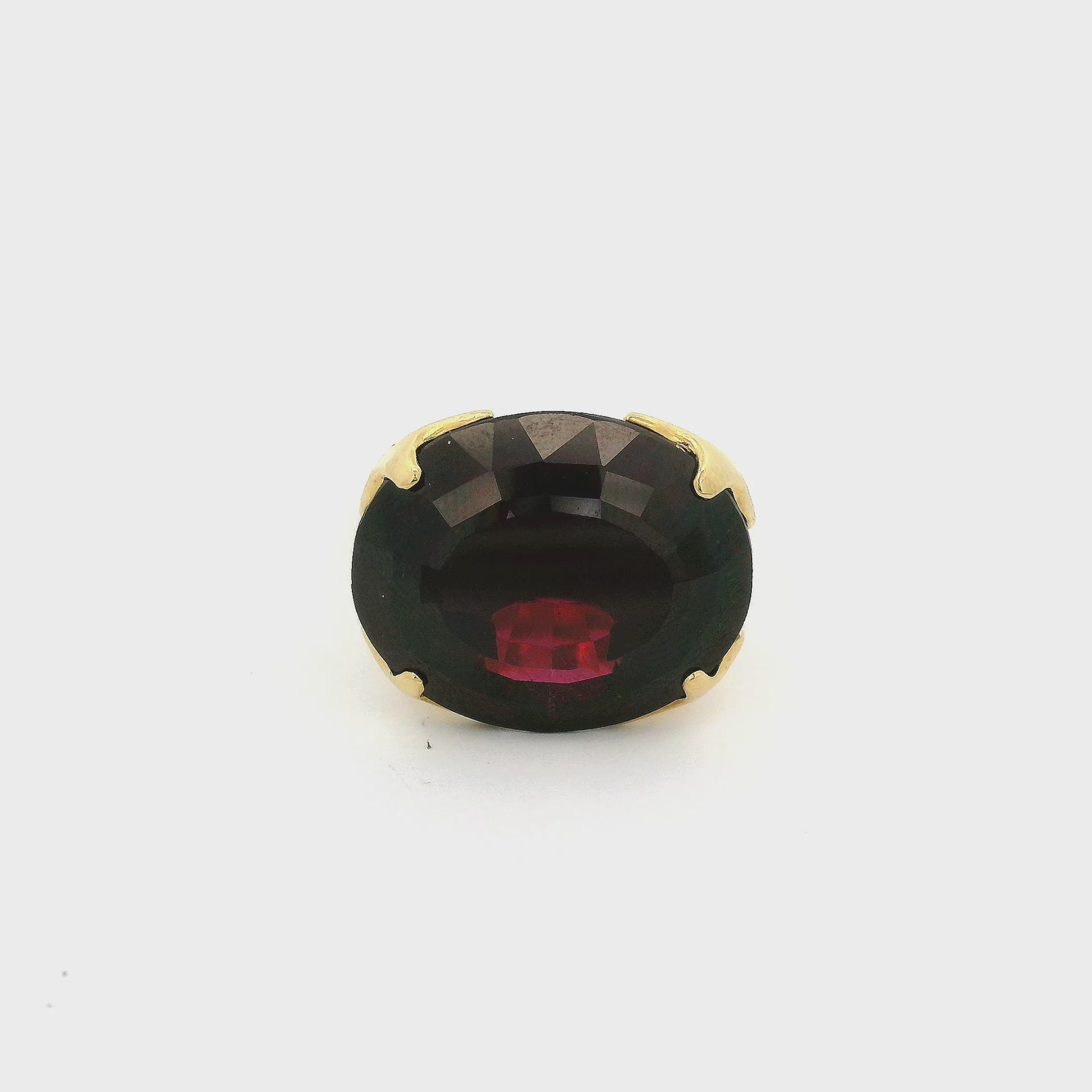 Red rhodolite garnet set in a yellow gold ring at forever rox fine jewelry