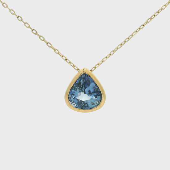 Pear Shape Ceylonesse Sapphire Pendant Set in a yellow gold bezel pendant at Forever Rox Fine Jewelry