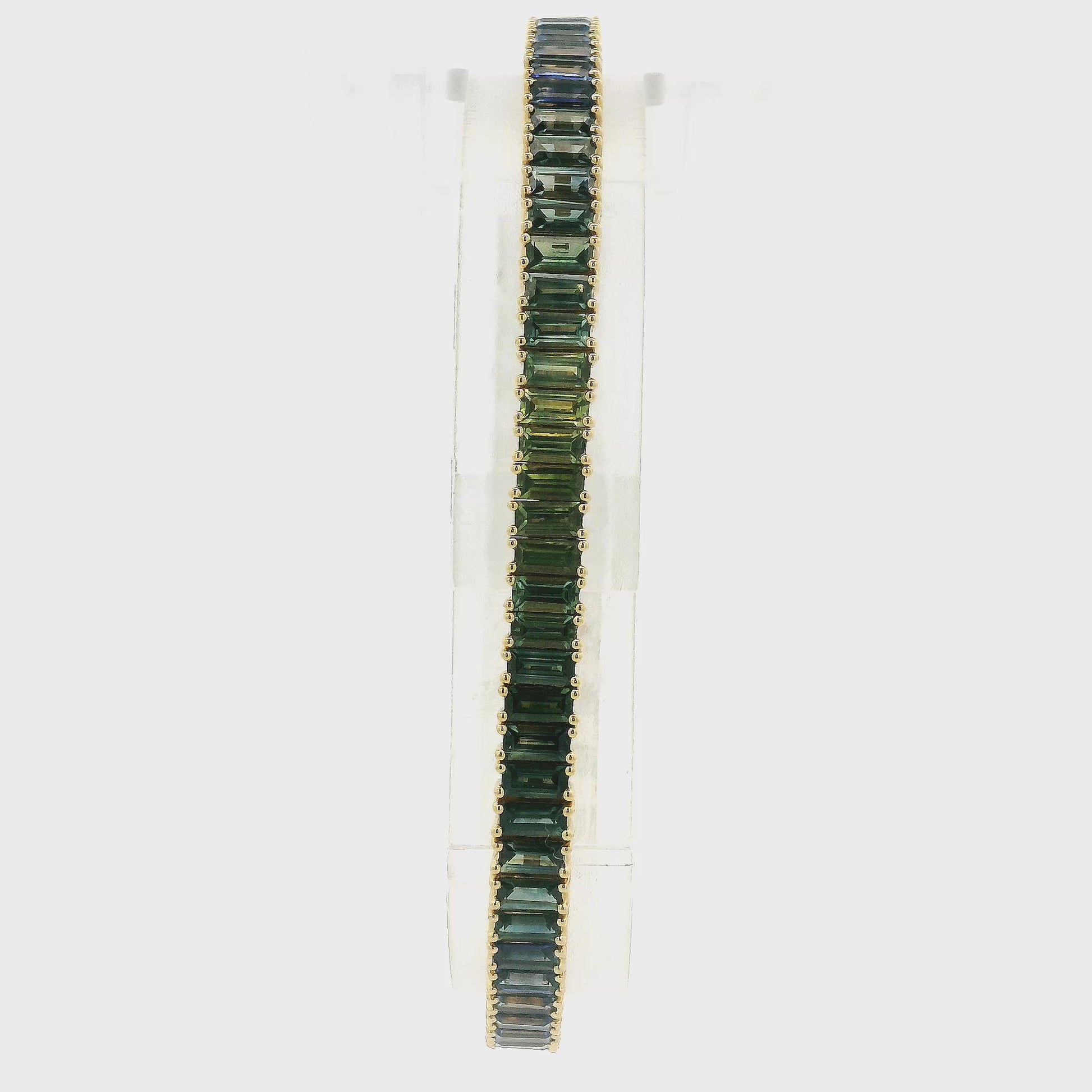 A Yellow Gold Bracelet with baguette cut green & blue natural Sapphires at Forever Rox Fine Jewelry, Lake Tahoes Best Jewelry Store