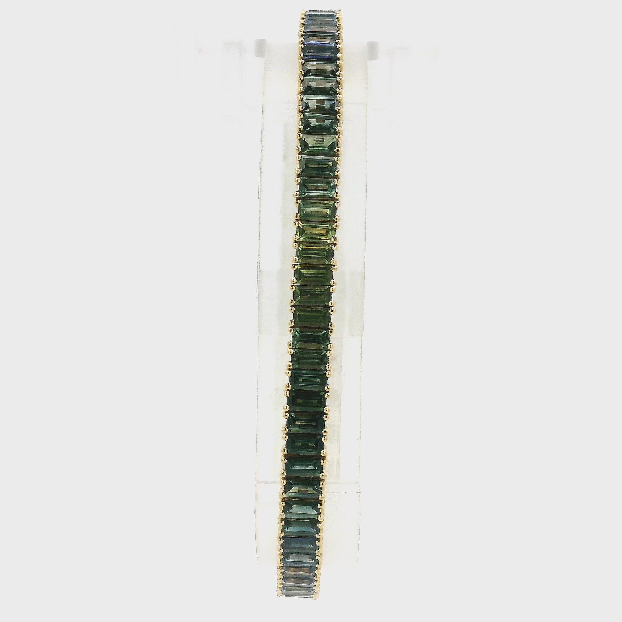 A Yellow Gold Bracelet with baguette cut green & blue natural Sapphires at Forever Rox Fine Jewelry, Lake Tahoes Best Jewelry Store