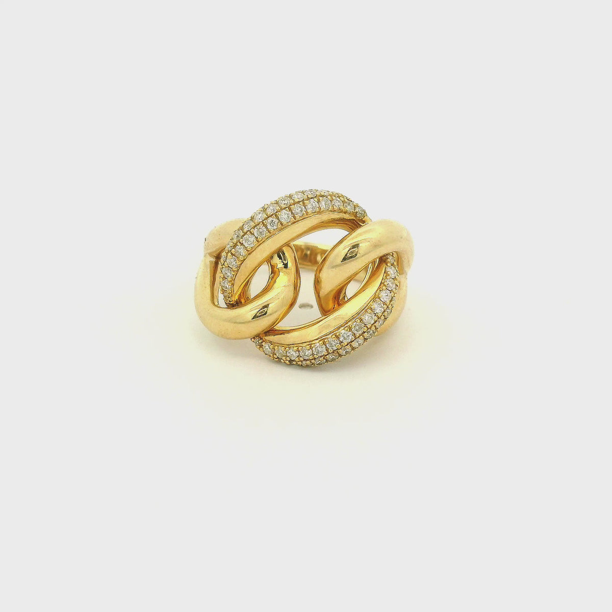 A Yellow Gold Knot Ring with the center of the know pavé set with diamonds at Forever Rox Fine Jewelry, Lake Tahoes Best Jewelry Store
