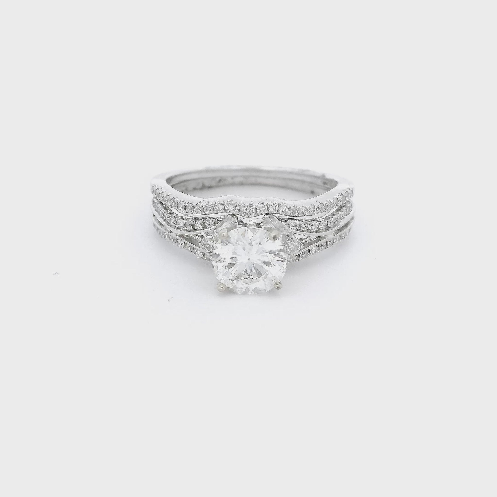 White gold ring with round cut diamonds & Baguette cut diamonds with a matching band at Forever Rox Fine Jewelry