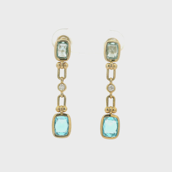 A Pair of Yellow Gold Dangle Earrings with bezel set cushion cut natural Swiis Blue Topaz & Blue Topaz and bezel set Diamonds at Forever Rox Fine Jewelry, Lake Tahoes Best Jewelry Store
