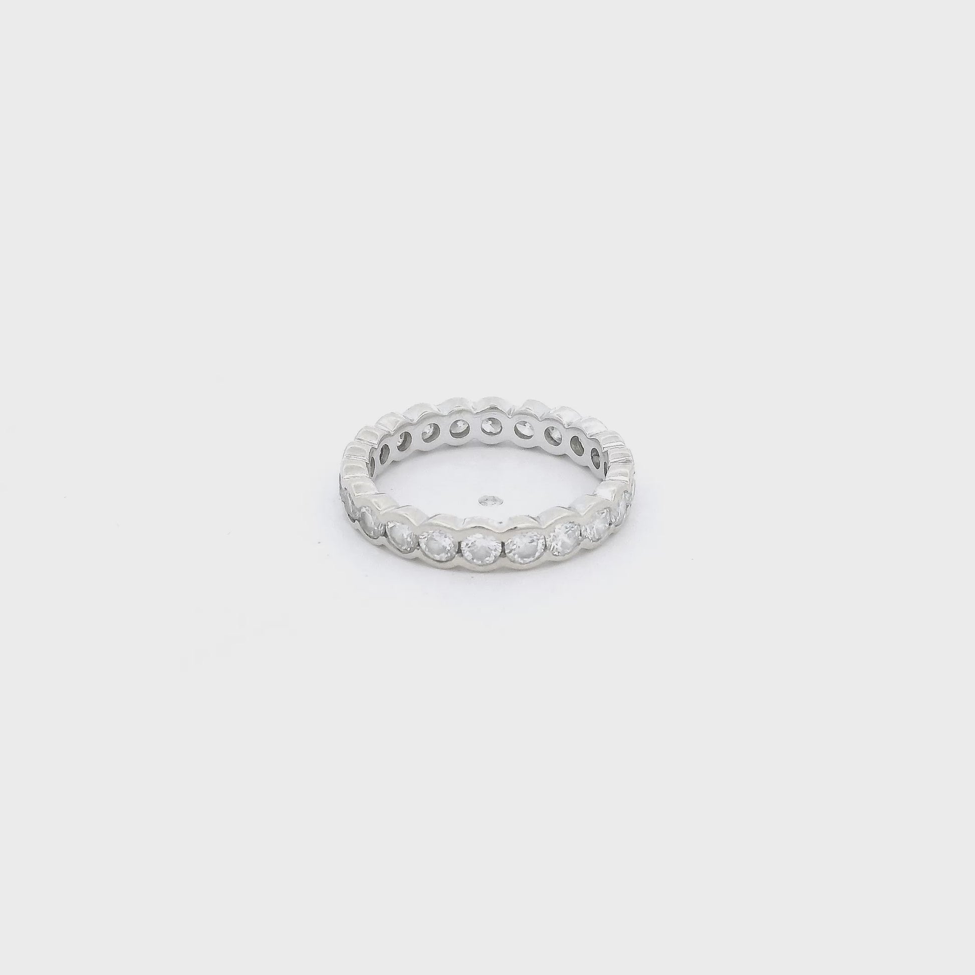 A White Gold Eternity Band with channel set round cut Diamonds at Forever Rox Fine Jewelry, Lake Tahoes Best Jewelry Store