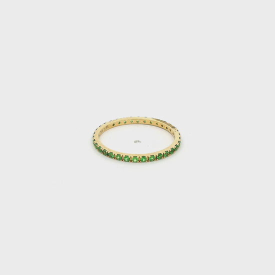 A Yellow Gold Eternity Band with Natrual Tsavorite Garnets at Forever Rox Fine Jewelry, Lake Tahoes Best Jewelry Store