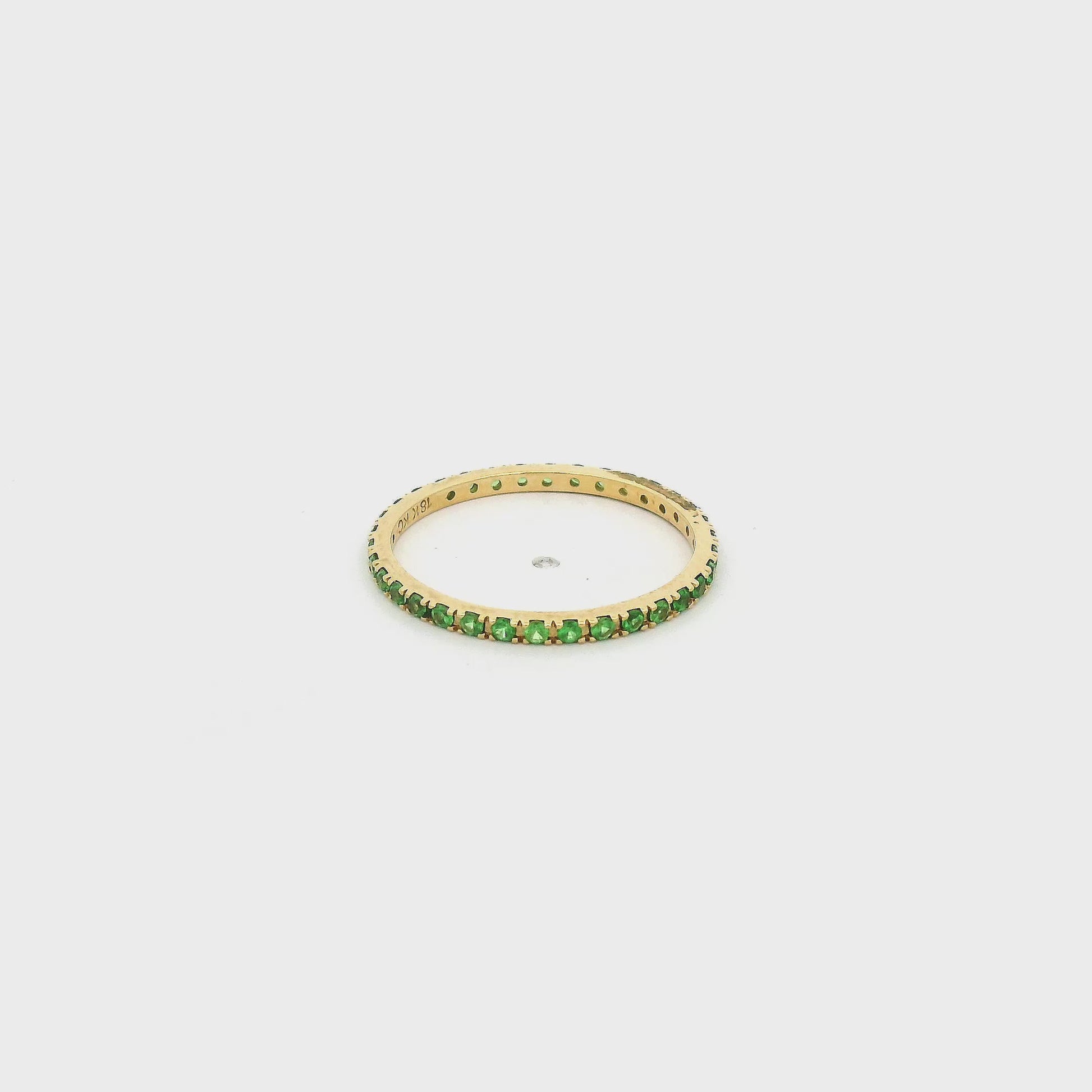 A Yellow Gold Eternity Band with Natrual Tsavorite Garnets at Forever Rox Fine Jewelry, Lake Tahoes Best Jewelry Store
