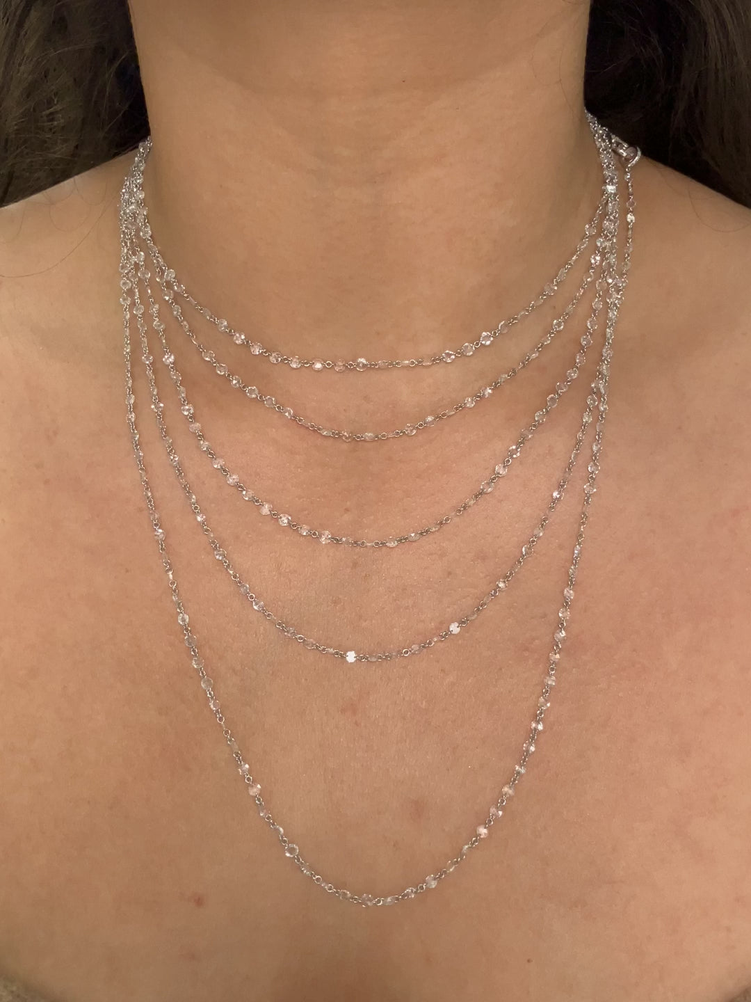 A White Gold Necklace that is 84" long with pierced rose cut natural Diamondsall along the chain at Forever Rox Fine Jewelry, Lake Tahoes Best Jewelry Store