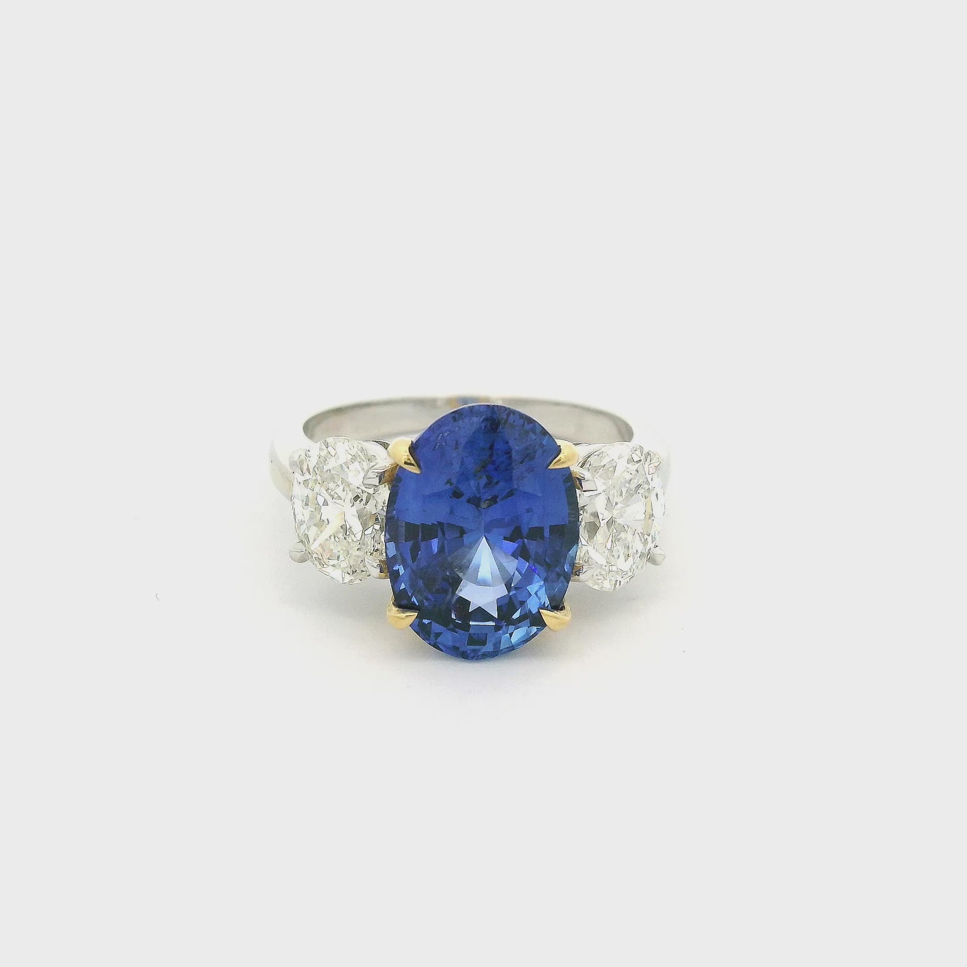 Ring with Oval Cut GIA Certified Ceylon Sapphire and Two Oval Cut Diamonds set in white and yellow gold at Forever Rox Jewelry