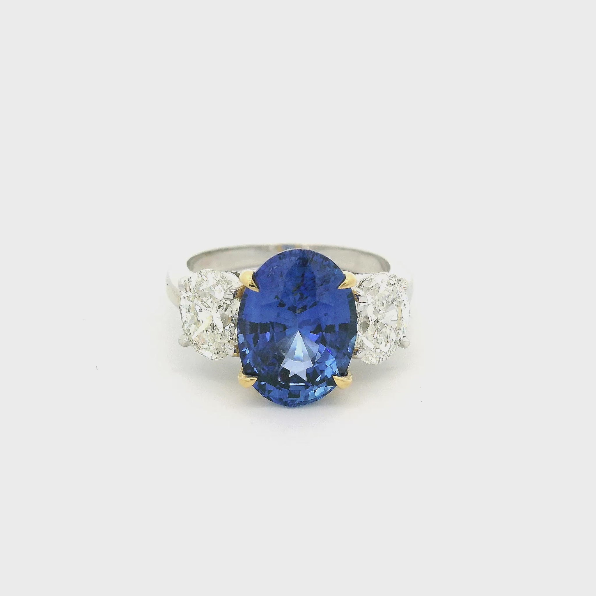 Ring with Oval Cut GIA Certified Ceylon Sapphire and Two Oval Cut Diamonds set in white and yellow gold at Forever Rox Jewelry