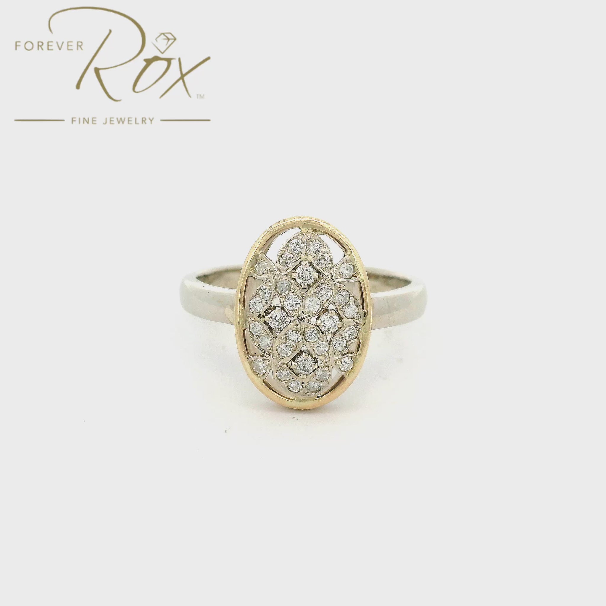 Custom Two Tone Ring with a vintage floral design in the center set with diamonds at Forever Rox Fine Jewlery