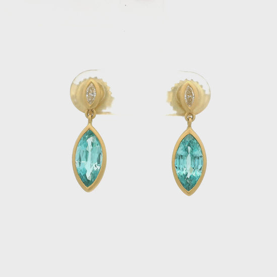 A Pair of Yellow Gold Dangle Earrings with bezel set marquise cut Blue Zircons and Diamonds at Lake Tahoes best Jewelry Store, Forever Rox Fine Jewelry