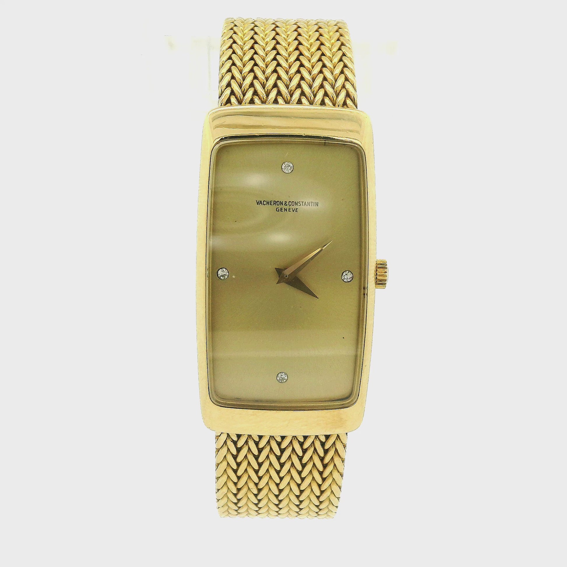 A vintage 18k yellow gold women's Vacheron Constantin watch with a rectangular bezel, gold dial, and a matching gold mesh bracelet, shown against a plain white background at Forever Rox Fine Jewelry, Lake Tahoes Best Jewelry Store