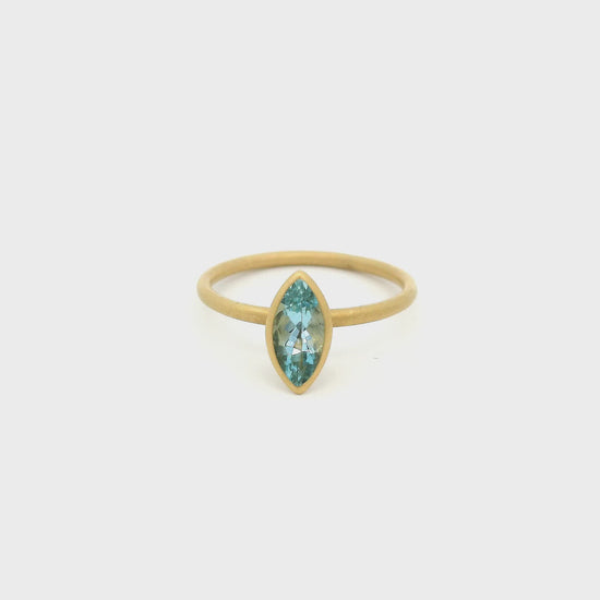 A Yellow Gold Ring with a solitaire bezel set marquise cut Aquamarine in the center at Forever Rox Fine Jewelry, Lake Tahoes Best Jewelry Store
