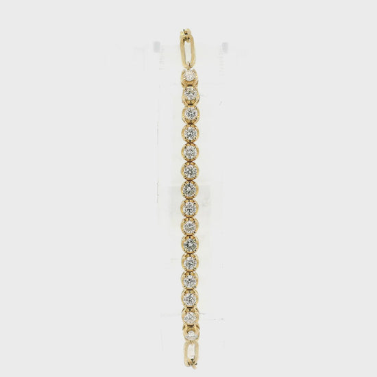 A Yellow Gold Bracelet with a 15 prong set round cut Diamonds set in the center at Forever Rox Fine Jewelry, Lake Tahoes Best Jewelry Store
