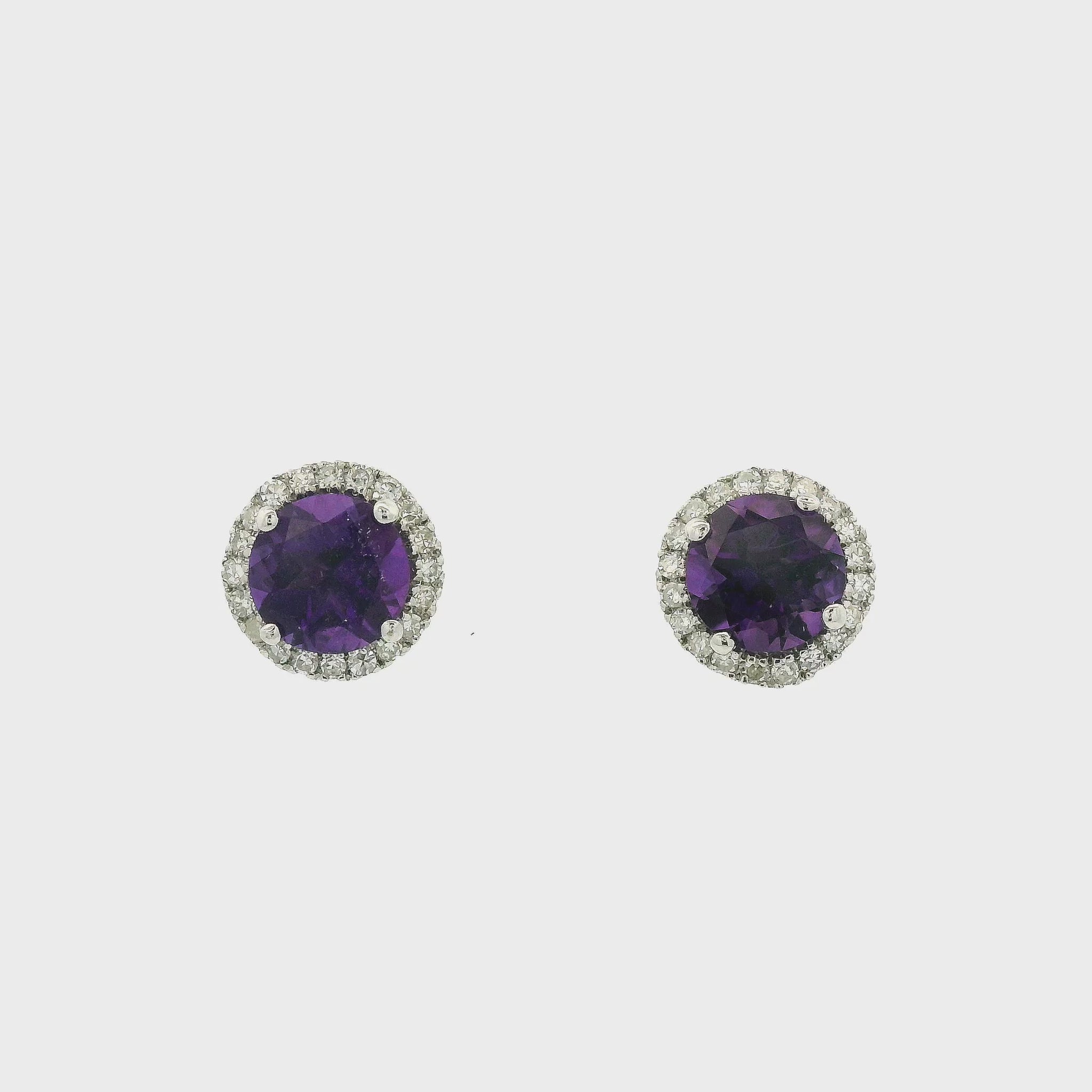 A White Gold Pair of Studs with prong set round cut natural Amethyst in the center with a halo of diamonds at Forever Rox Fine Jewelry, Lake Tahoes Best Jewelry Store