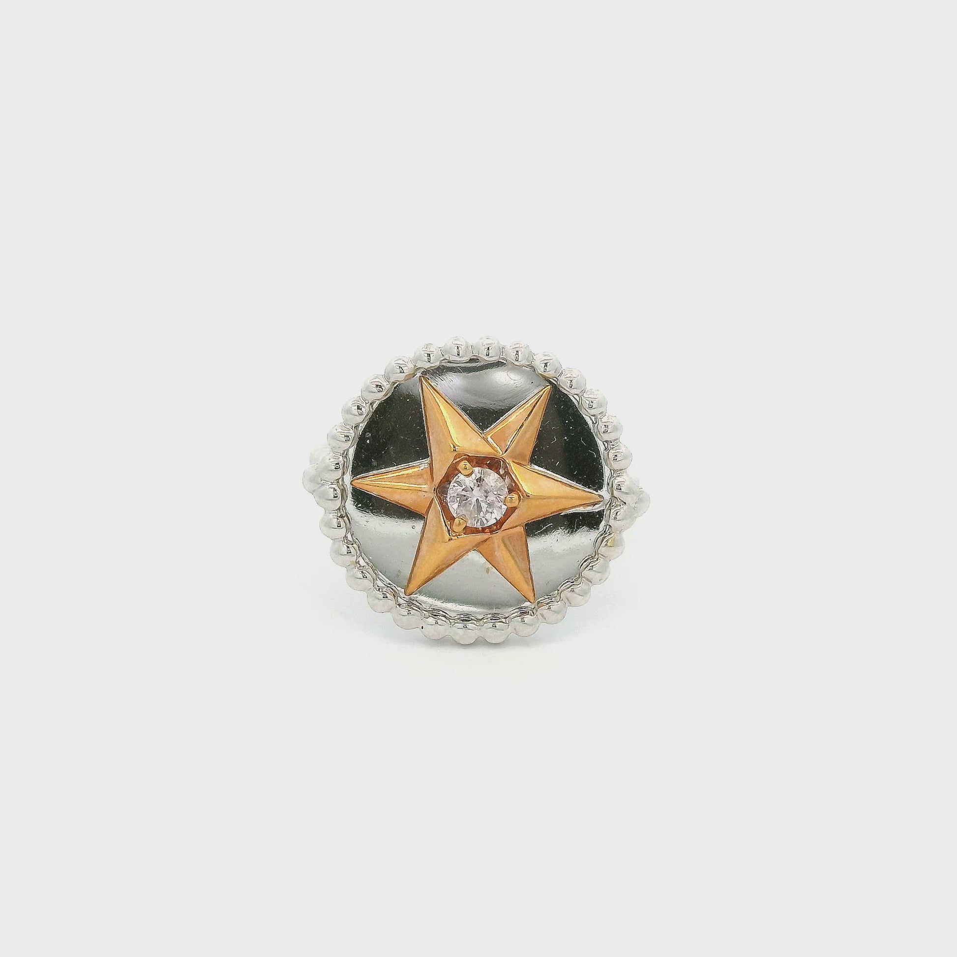 A White Gold Ring with a bezel set round cut natural Pink Diamond in the center of a rose gold star at Forever Rox Fine Jewelry, Lake Tahoes Best Jewelry Store