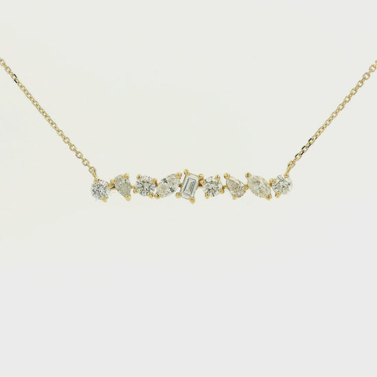 A Yellow Gold Bar Pendant with round, pear, marquise & emerald cut Diamonds at Forever Rox Fine Jewelry, Lake Tahoes Best Jewelry Store
